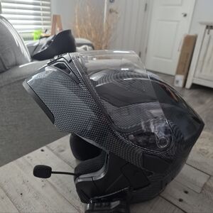 Like new, motorcycle helmet full face with bluetooth headset.